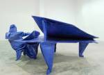 Matt Johnson. <em>The Pianist (after Robert J. Lang)</em> 2005. Blue tarp, paper, stainless stee,l 147x 340 x 198cm. Courtesy of the Saatchi Gallery, London. &copy;Matt Johnson, 2009.