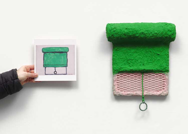 Olivia Bax with a postcard of Philip Guston