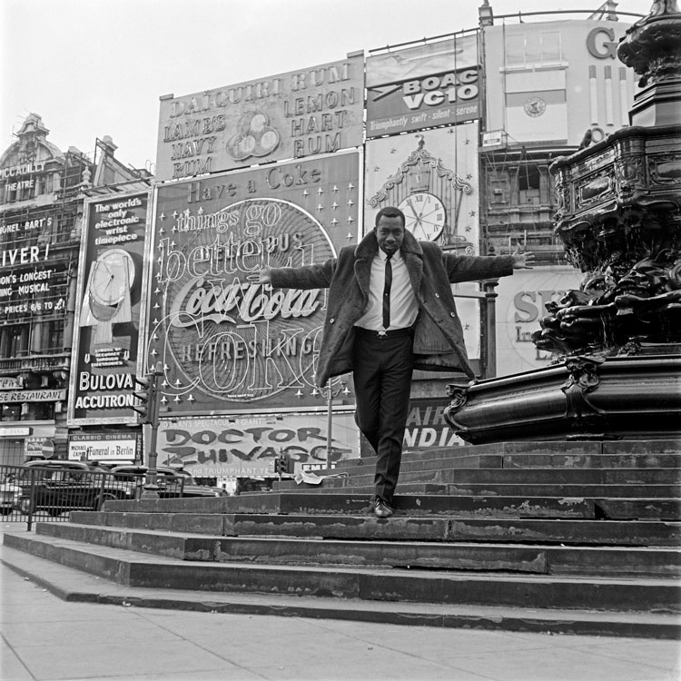 James Barnor. Mike Eghan at Piccadilly Circus, London, 1967. Courtesy Autograph @autographabp.