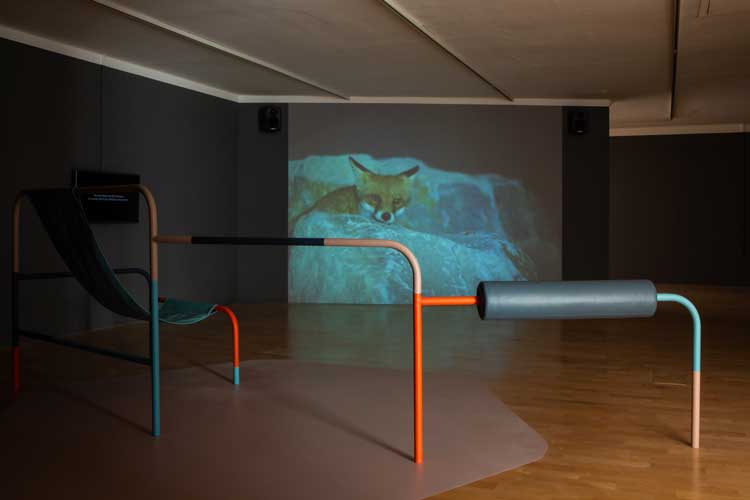 Céline Condorelli and Ben Rivers with Jay Bernard. After Work, 2021. Colour, sound, 16 mm transferred to HD, 12:55. Installation view, Céline Condorelli: After Work, Talbot Rice Gallery, University of Edinburgh. Courtesy the artist and Talbot Rice Gallery. Photo: Sally Jubb.