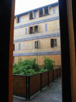 The internal courtyard of building with its timber fa&ccedil;ade.