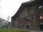 An interplay of concrete structures with in-fill &lsquo;roof tile&rsquo; wall.