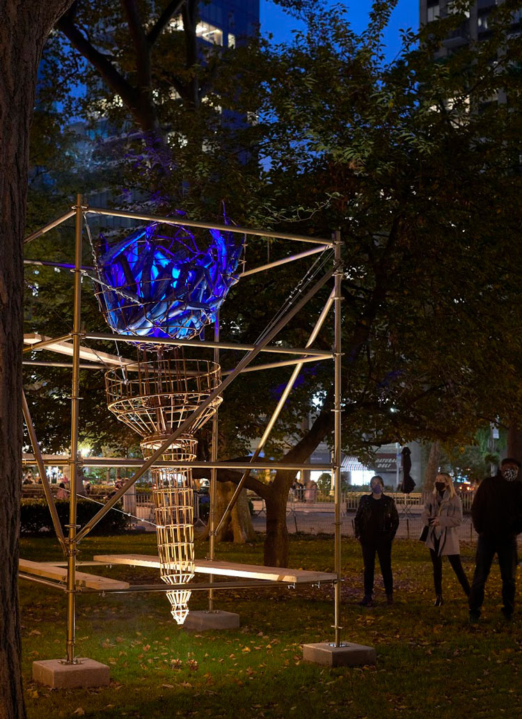 Abigail DeVille. Light of Freedom, 2020. Welded steel, cabling, rusted metal bell, mannequin arms, metal scaffolding, wood, 156 x 96 x 96 inches approximately. Collection the artist. Madison Square Park Conservancy, New York. Photo: Andy Romer.