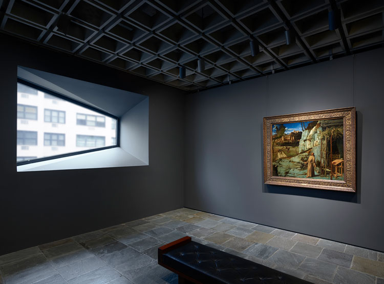 Room 13: Bellini’s St. Francis in the Desert, one of the Frick’s most important and loved works, is displayed in isolation, paired with one of the iconic trapezoidal windows Marcel Breuer conceived for the building. Photo: Joe Coscia, courtesy The Frick Collection.
