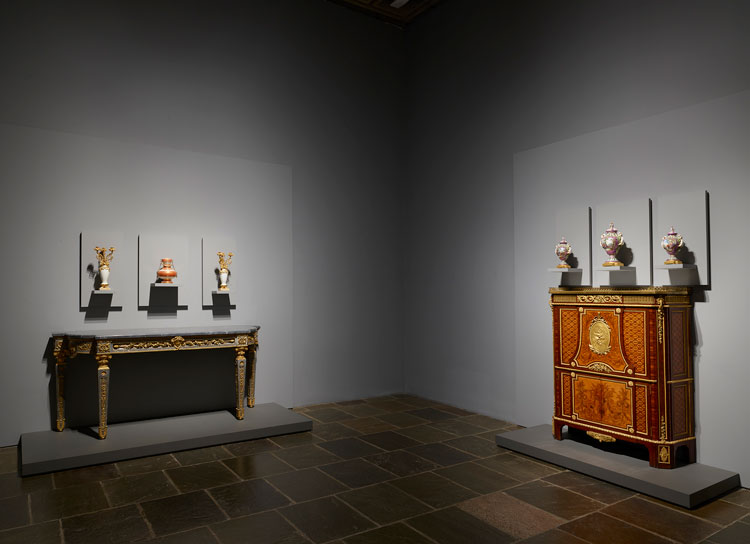 Room 19: In this gallery of French decorative arts, a remarkable side table of blue Turquin marble and gilt-bronze mounts by Pierre Gouthière is shown with a secretaire by Riesener commissioned for Marie- Antoinette. Additional works by Gouthière and Sèvres are displayed above these important pieces of furniture. Photo: Joe Coscia, courtesy The Frick Collection.