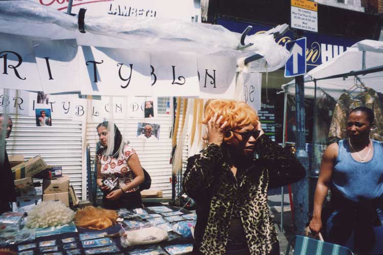 Joy Gregory, Stockwell Siren from the series Celebrity Blonde, 2001. Performance. © Joy Gregory.