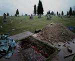 Jeff Wall, <em>The Flooded Grave</em>, 1998&circ;2000. Silver dye bleach transparency in light box 89 15/16 x 111 in. (228.5 x 282 cm). The Art Institute of Chicago, promised gift of Pamela J. and Michael N. Alper; Claire and Gordon Prussian Fund for Contemporary Art; Harold L. Stuart Endowment; through prior acquisitions of the Mary and Leigh Block Collection &copy; Jeff Wall 