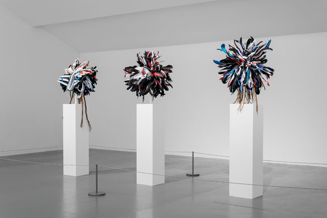 Brian Jungen, Warrior 1, 2017, Warrior 3, 2017 and Warrior 4, 2017. Installation view at Tate Liverpool, Liverpool Biennial 2018. Courtesy the artist and Casey Kaplan, New York. Photo: Thierry Bal.