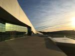 The glazed façade of Lascaux IV at dusk. Photograph: Veronica Simpson.