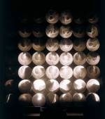 Julio Le Parc. Continuel-lumière avec 49 cylindres vitesse lente, 1967. Object: painted wood and polystyrène foil. 
Two apparatuses: painted wood, motors, metal cylinders and light. Object: 203 x 203.5 x 20 cm. Edition of nine, no. 1/9