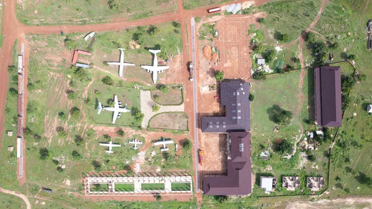 Aerial view of Red Clay Studio with decommissioned airplanes for classrooms. © Ibrahim Mahama. Photo courtesy of the SCCA and Red Clay, Tamale.