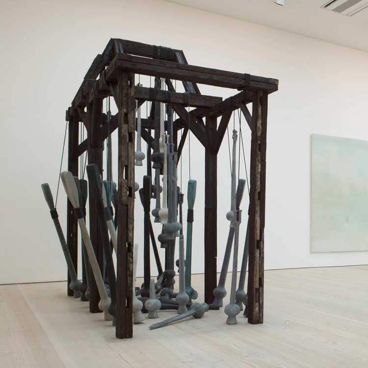 Nika Neelova, Principles of surrender, 2010. Burnt timber, bell clappers cast in wax infused with ash, rope, 250 x 150 x 300 cm. Photo copyright Stephen White.
