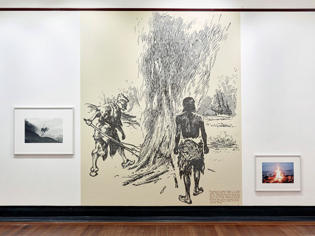 Roger Palmer. Fire, in Refugio - after Selkirk after Crusoe, Kirkcaldy Galleries, 2019. Vinyl, marker pen, acrylic, silver gelatin and inket photographs, 301 x 447 cm. Photo: John C McKenzie.