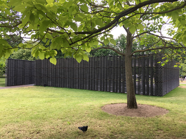 Frida Escobedo’s Serpentine Pavilion 2018 sits quietly in its surroundings. Photograph: Veronica Simpson.