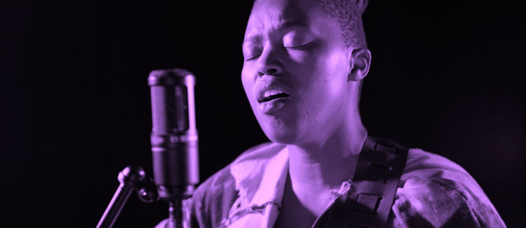 Gabrielle Goliath, This song is for ... Deborah Ho-Chung, 16 mins 2 secs. Everybody Hurts (by REM). Performed by Msaki, featuring Lebogang Ledwaba & Thembinkosi Mavimbela. 2019–ongoing. Single-channel projection with dual stereo audio. Installation view, The Normal, Talbot Rice Gallery, 2021. Courtesy of Talbot Rice Gallery, University of Edinburgh. Photo: Sally Jubb.