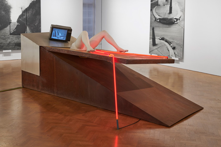 VALIE EXPORT. Geburtenbett, 1980. Wedge, rusted steel structure. Bed: steel frame with bedsprings covered with polyester; Women