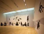 Kara Walker, <i>The Hot Black Road to Freedom, a double-dixie two-step 
        (Detail)</i>, 2005. Cut paper and adhesive on wall. Collection of the 
        artist and Brent Sikkema, New York. Installation view: The World is a 
        Stage: Stories Behind Pictures. Photo: Kioku Keizo. Photo courtesy: Mori 
        Art Museum